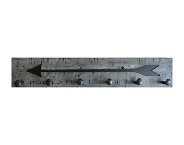 Wood wall coat rack with arrow burned into the wood. Reclaimed wood and railroad spikes as hooks.