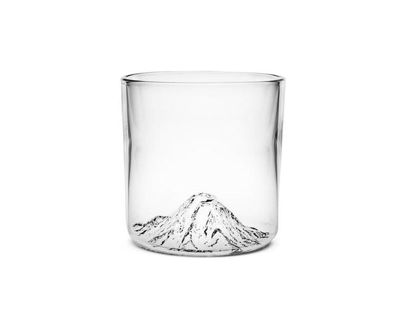 Handblown tumbler glass with Mt Rainier molded into the bottom of the glass.